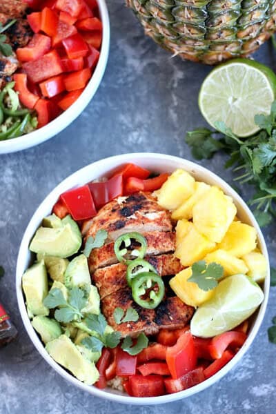 Chile Lime Chicken Quinoa Bowls with pineapple, avocado and bell pepper.
